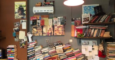 Photos of the bookstore's cats, artsy knickknacks and collector items are scattered across this sahaf in Ankara, Turkey. (Photo by Matt Hanson)