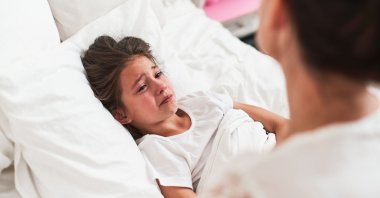 Anxiety, withdrawal and crying fits can be signs that children are overwhelmed with lockdowns and the pandemic. (Shutterstock Photo)