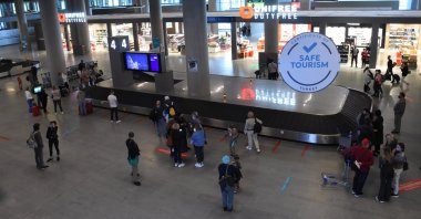 Tourists at Dalaman Airport, Muğla, southwestern Turkey, March 19, 2021. (AA Photo)