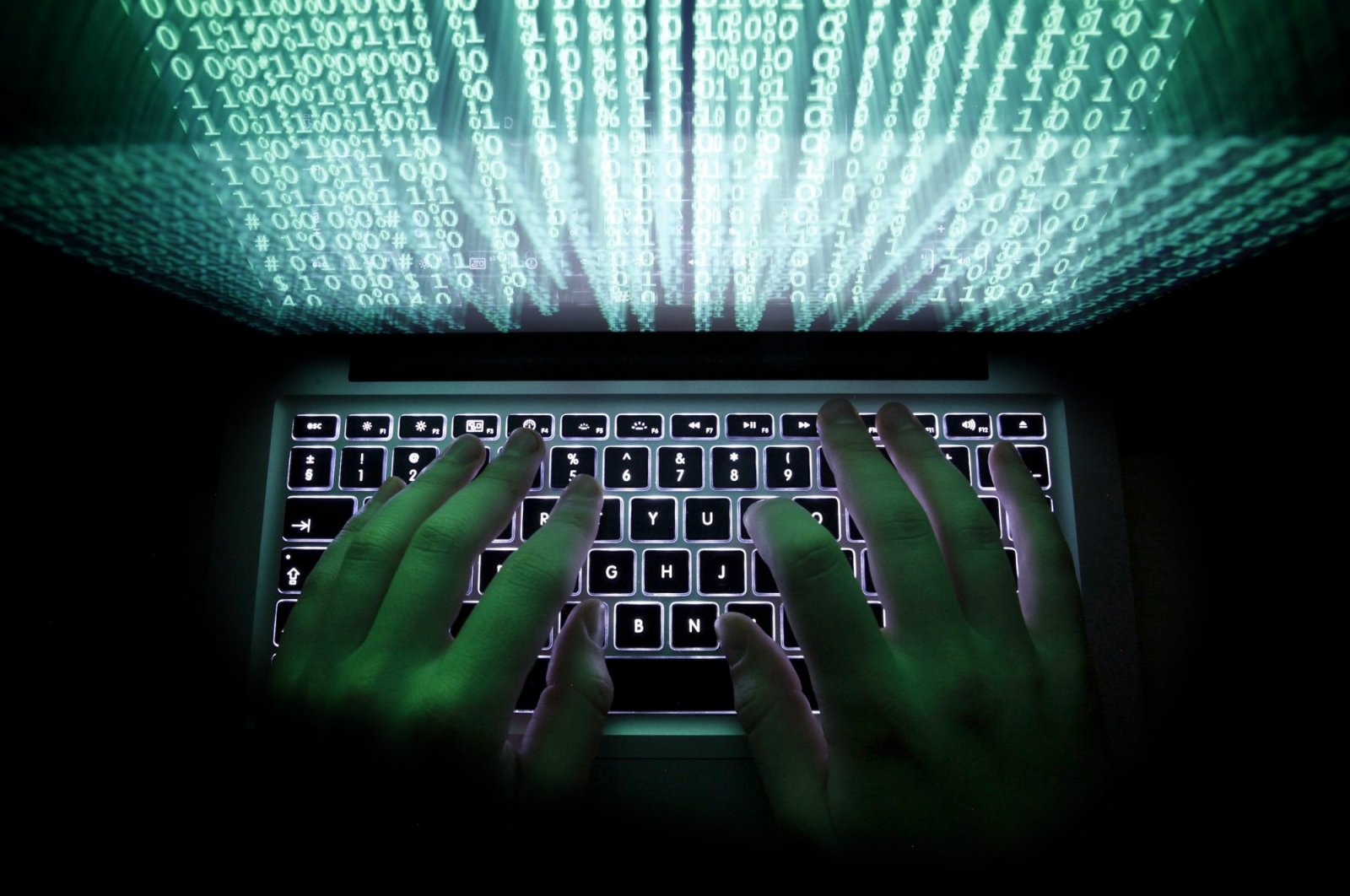 A man types on a computer keyboard in Warsaw, Feb. 28, 2013. (Reuters File Photo)