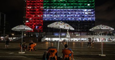The United Arab Emirates's national flag displayed on a building following the UAE-Israel normalization deal, Tel Aviv, Israel, Aug. 13, 2020. (Photo by Getty Images)