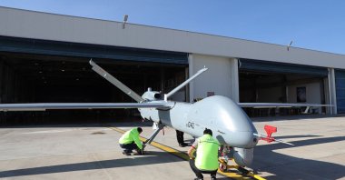TAI's Anka drone is checked by employees in Ankara, Turkey, March 5, 2021. (AFP Photo)