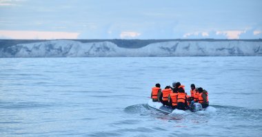 Migrants in a dinghy sail in the Channel toward the south coast of England after crossing from France, Sept. 1, 2020. (AFP Photo)