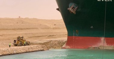 A part of the Taiwan-owned MV Ever Given lodged sideways on the waterway of Suez Canal, Egypt, March 24, 2021. (AFP Photo)