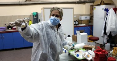 Associate professor Zuhal Gerçek shows the active substance in her laboratory, in Zonguldak, northern Turkey, March 25, 2021. (DHA PHOTO)
