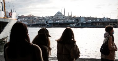 Passengers are seen leaving a ferry during a partial lockdown against the COVID-19 pandemic, Istanbul, Turkey, March 7, 2021. (Photo by Getty Images)