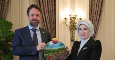 First lady Emine Erdoğan (R) receives an award from UNDP representative Claudio Tomasi, in the capital Ankara, Turkey, March 25, 2021. (Courtesy of the Presidency)