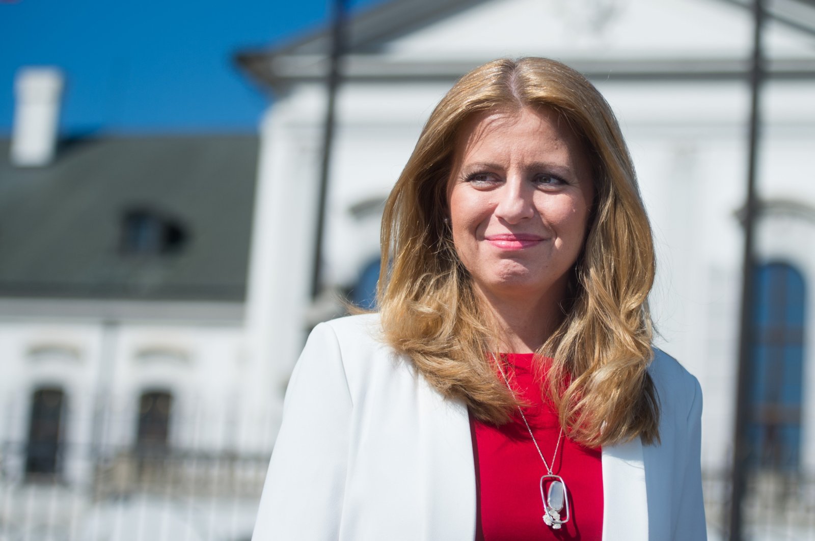 Newly elected Slovak President Zuzana Caputova speaks to a journalist in front of the Presidential Palace in Bratislava, Slovakia, March 31, 2019. (AFP Photo)