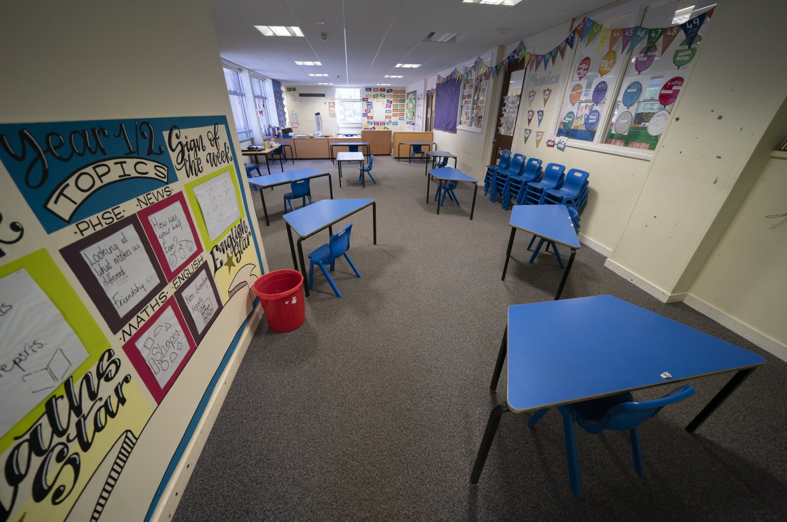 A classroom with safely spaced desks laid out before the possible reopening of Lostock Hall Primary school in Poynton near Manchester, U.K., May 20, 2020. (AP Photo)