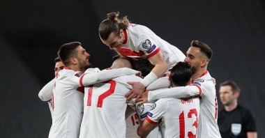 Turkey players celebrate after a goal in the FIFA World Cup Qatar 2022 qualification match against The Netherlands at the Atatürk Olympic Stadium, in Istanbul, Turkey, March 24, 2021. (AFP Photo)