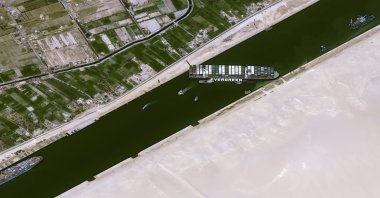 A satellite image shows the stranded container ship Ever Given in Suez Canal, Egypt, March 25, 2021. (CNES/Airbus DS via Reuters)