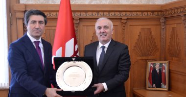 Ziraat Bank's former chief Hüseyin Aydın (R) hands over his duties to the lender's new General Manager Alpaslan Çakar, Ankara, Turkey, March 26, 2021. (Ziraat Bank via AA)