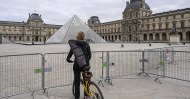 The Louvre is seen cordoned off as the COVID-19 lockdown in France closes the museum to visitors, Paris, France, March 22, 2021. (Photo by Julien Mattia via AA)