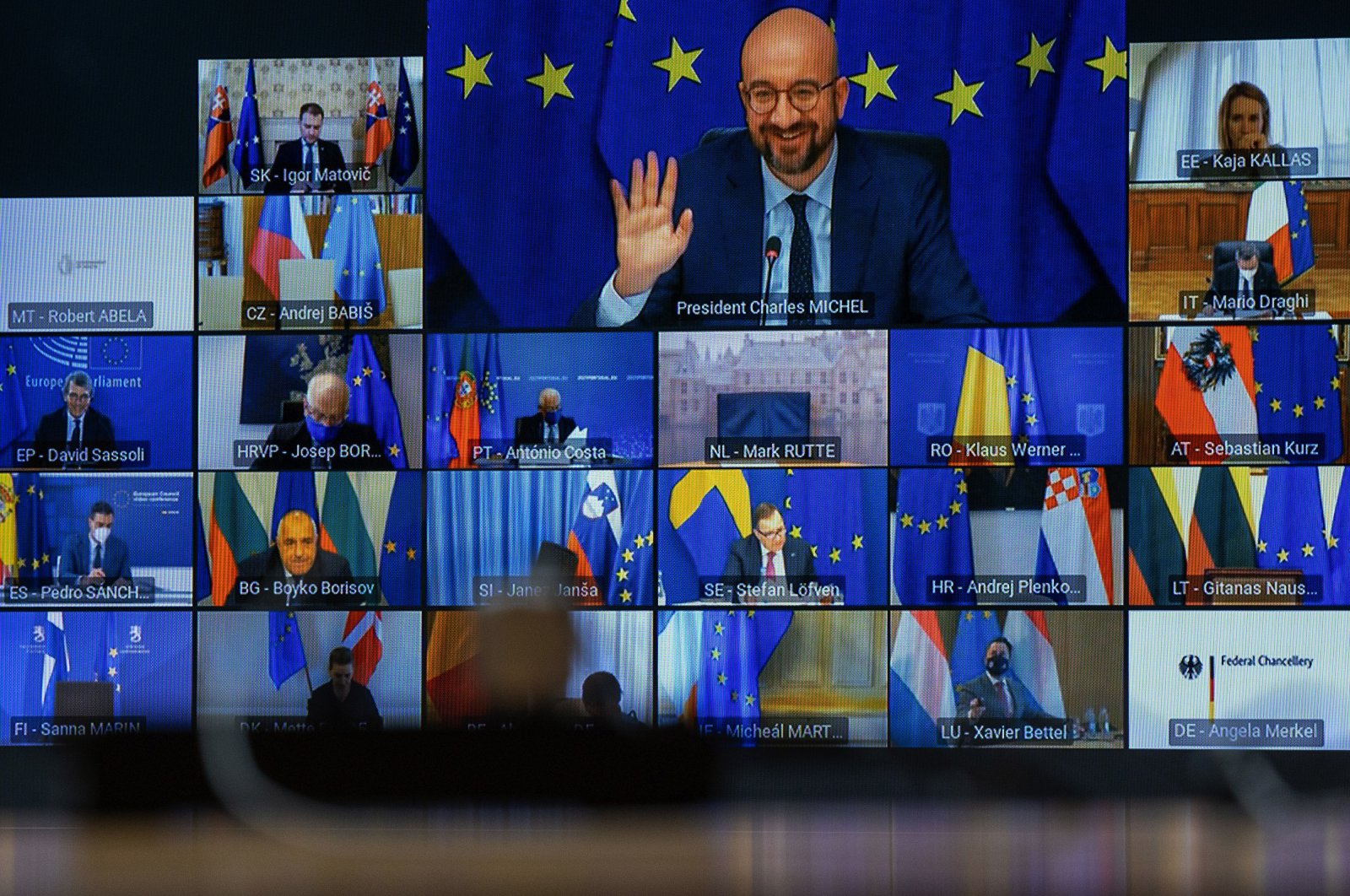 A bank of video conference screens shows European Council President Charles Michel (top C) and European Union leaders during a virtual European Union summit in Brussels, Belgium, March 25, 2021. (Getty Images Photo)