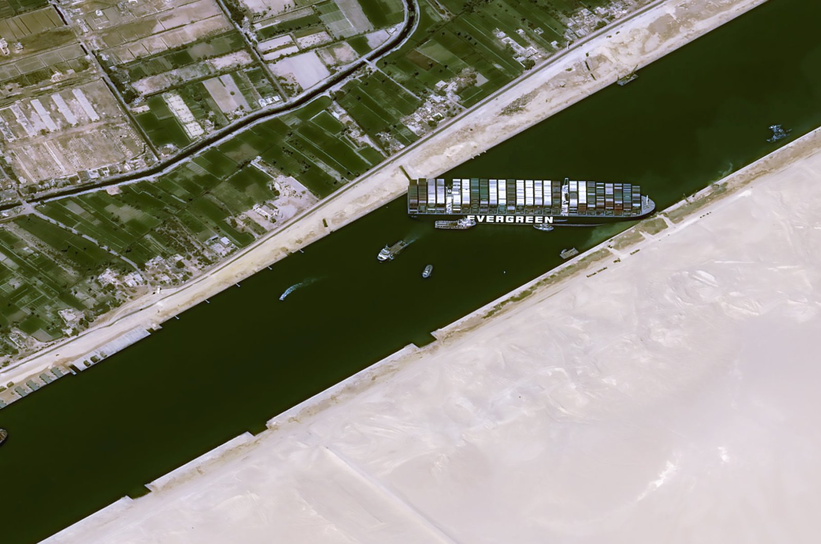 A satellite image shows the stranded container ship Ever Given in Suez Canal, Egypt, March 25, 2021. (CNES/Airbus DS via Reuters)