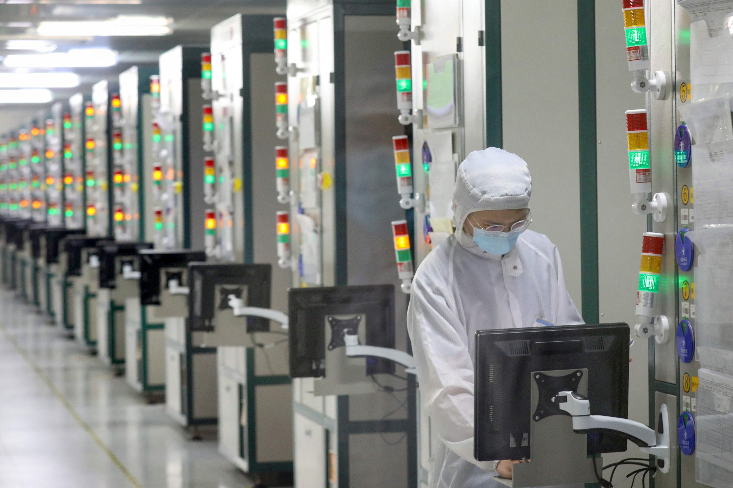 An employee works at a factory of Jiejie Semiconductor Company in Nantong, in Jiangsu province, China, March 17, 2021. (AFP Photo)