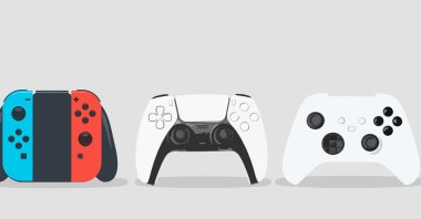 Controllers of gaming consoles (L-R): Nintendo Switch, PlayStation 5, XBox Series X. (Shutterstock Photo)