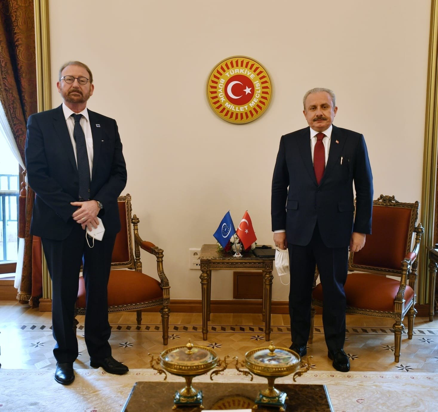 Rik Daems (L), the president of the Parliamentary Assembly of the Council of Europe, and Parliamentary Speaker Mustafa Şentop pose for a picture after their meeting in the capital Ankara, Turkey, March 30, 2021 (IHA Photo)
