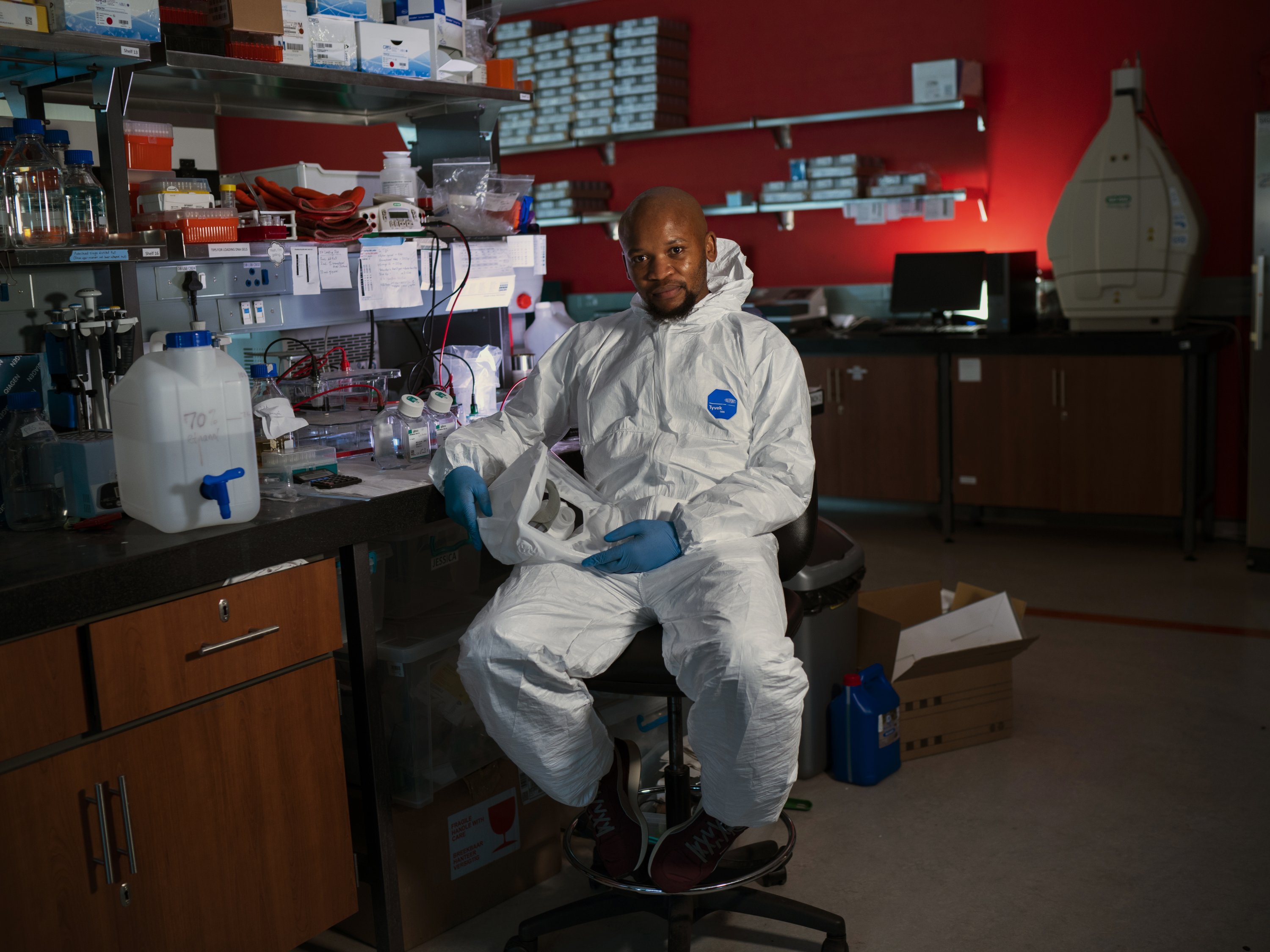 Sandile Cele – a doctoral candidate at the University of Kwazulu-Natal who figured out how to grow the South African variant of the coronavirus in the laboratory, which enabled them to test it and discover that people previously infected with COVID-19 don't produce antibodies against the mutant version – poses in a lab in Durban, South Africa, March 4, 2021. (AP Photo)