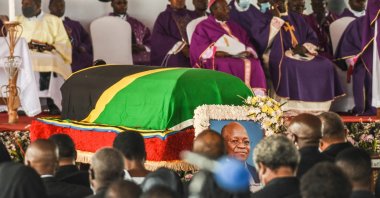 The coffin of late Tanzanian President John Magufuli being carried during the farewell mass at Magufuli Stadium in Chato, Tanzania, on March 26, 2021. (AFP Photo)