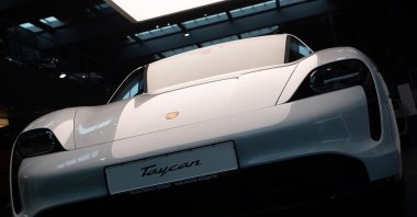 An electric Porsche Taycan Turbo S stands in the Porsche centre, Stuttgart, Germany, March 16, 2021. ( Getty Images )