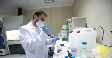 A staff member works at a vaccine development lab at Hacettepe University, in the capital Ankara, Turkey, Jan. 26, 2021. (AA PHOTO) 