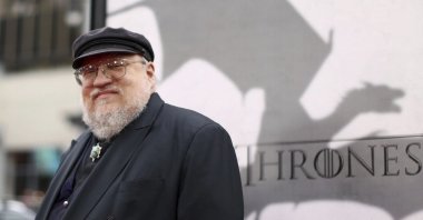 Author George R.R. Martin arrives at the premiere for the third season of the HBO television series "Game of Thrones" at the TCL Chinese Theatre in Los Angeles, U.S., March 18, 2013. (AP Photo)