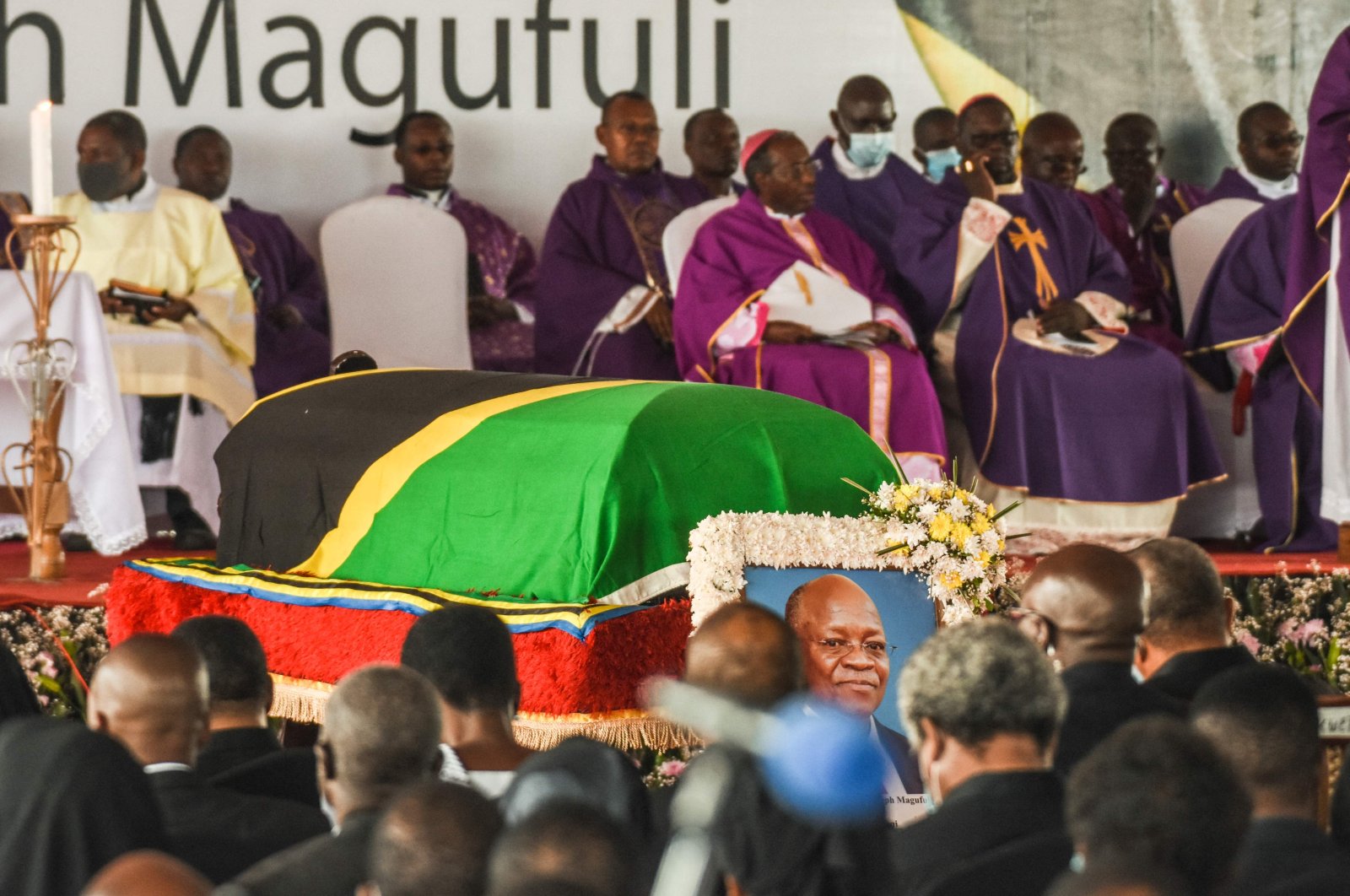 The coffin of late Tanzanian President John Magufuli being carried during the farewell mass at Magufuli Stadium in Chato, Tanzania, on March 26, 2021. (AFP Photo)