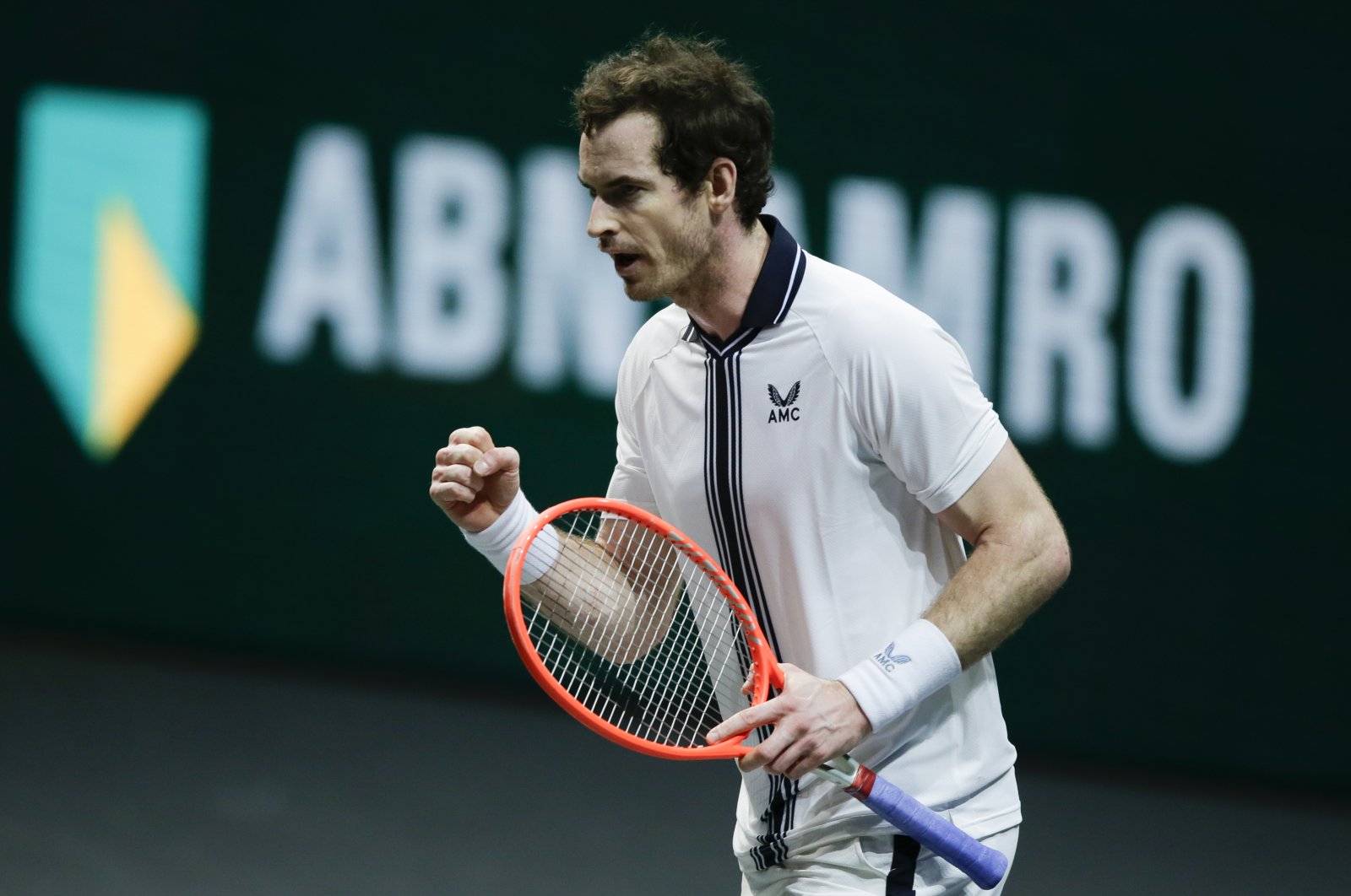 Britain's Andy Murray clenches his fist after defeating Netherland's Robin Haase in the first round of the ABN AMRO world tennis tournament at Ahoy Arena in Rotterdam, Netherlands, March 1, 2021. (AP Photo)