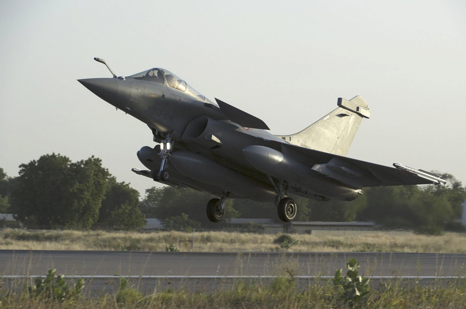 A French Rafale fighter jet lands in Ndjamena, Chad before being deployed in Mali, in this picture provided by the French Military Communications Audiovisual office (ECPAD) and taken on Jan. 13, 2013. (Military Politics Transport via Reuters)