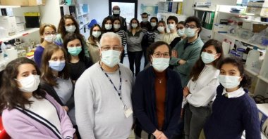 Mayda and Ihsan Gürsel (front R and L) pose with fellow researchers at a hospital where trials began in the capital Ankara, Turkey, March 27, 2021. (AA PHOTO)
