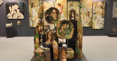 Artworks on women made by female teachers working at the Ankara Metropolitan Municipality are seen in this photo at the contemporary art fair ARTANKARA, Ankara, Turkey, March 30, 2021 (Photo by Dilara Aslan)