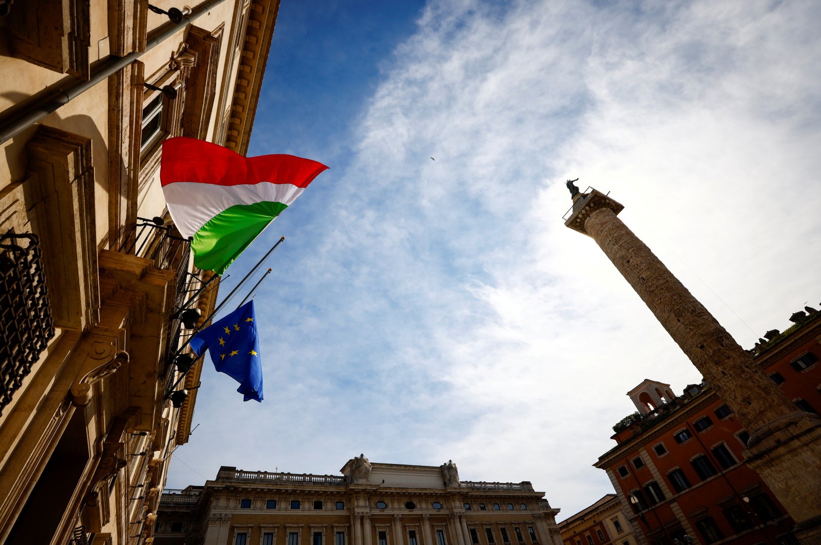 The Italian and EU flags fly outside the Prime Minister’s office during Italy's National Day, Rome, Italy, March 18, 2021. (Reuters Photo)