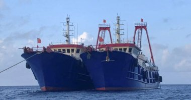 Chinese vessels are moored at Whitsun Reef, South China Sea on March 27, 2021. (AP Photo)