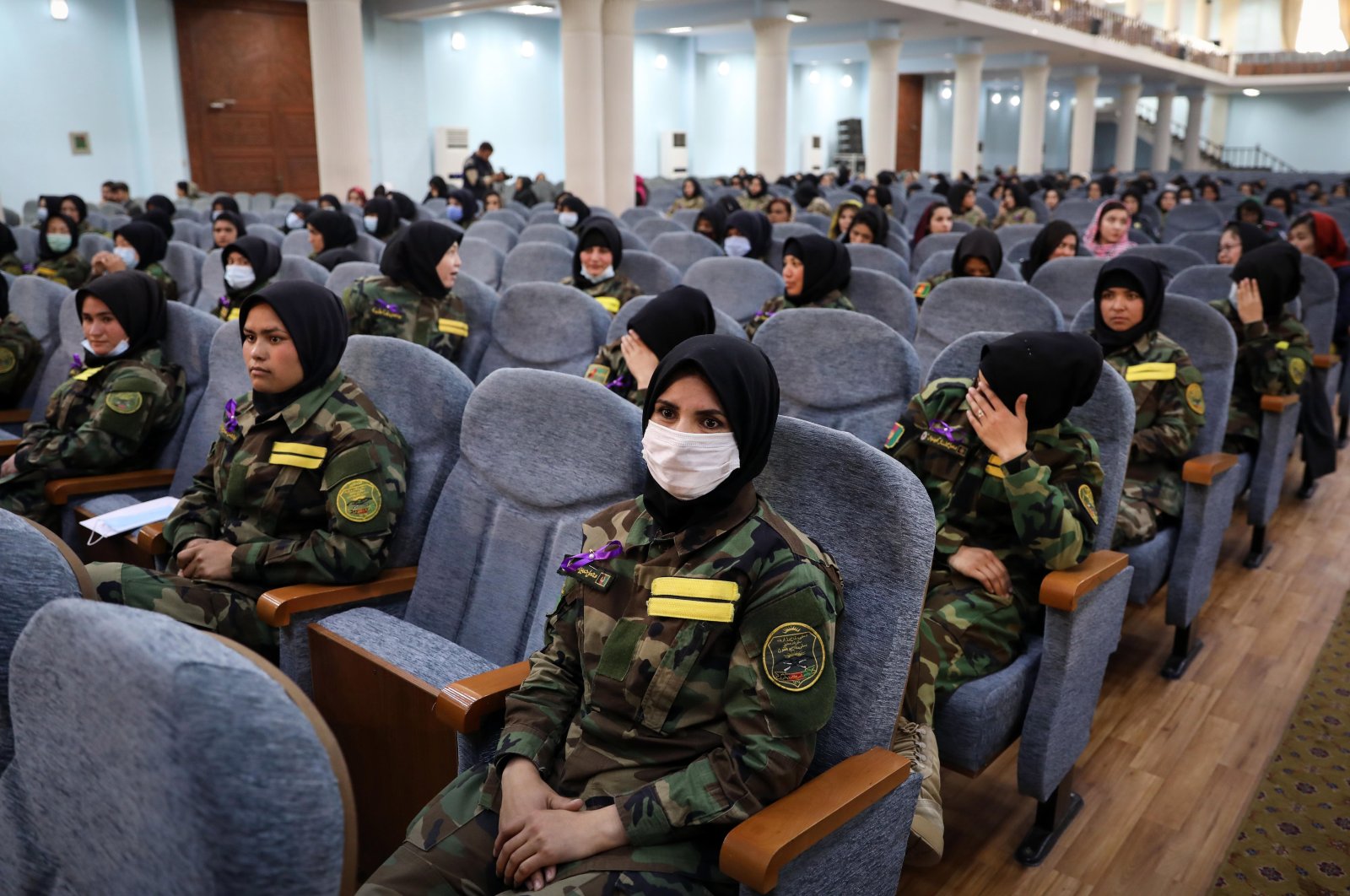 Female police officers attend an event ahead of International Women's Day, in Kabul, Afghanistan, March 7, 2021. (EPA)