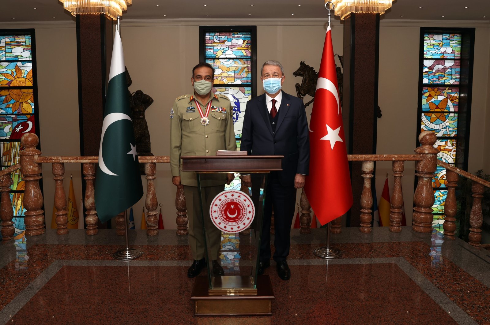 Turkey's Defense Minister Hulusi Akar (R) and Pakistan's Gen. Nadeem Raza, chairperson of Joint Chiefs of Staff Committee, meet in the capital Ankara, Turkey, March 30, 2021. (İHA Photo)