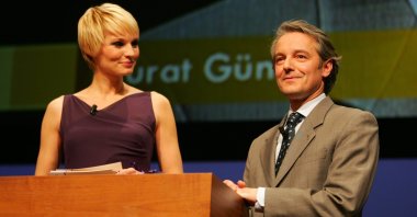 Murat Günak (R) at the world premiere of the Passat In Cruise Center at HafenCity in Hamburg, Germany. (Getty Images)