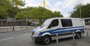 A police car stands at the Signal Iduna Park before the German first division Bundesliga football match in Dortmund, May 16, 2020. (AFP File Photo)