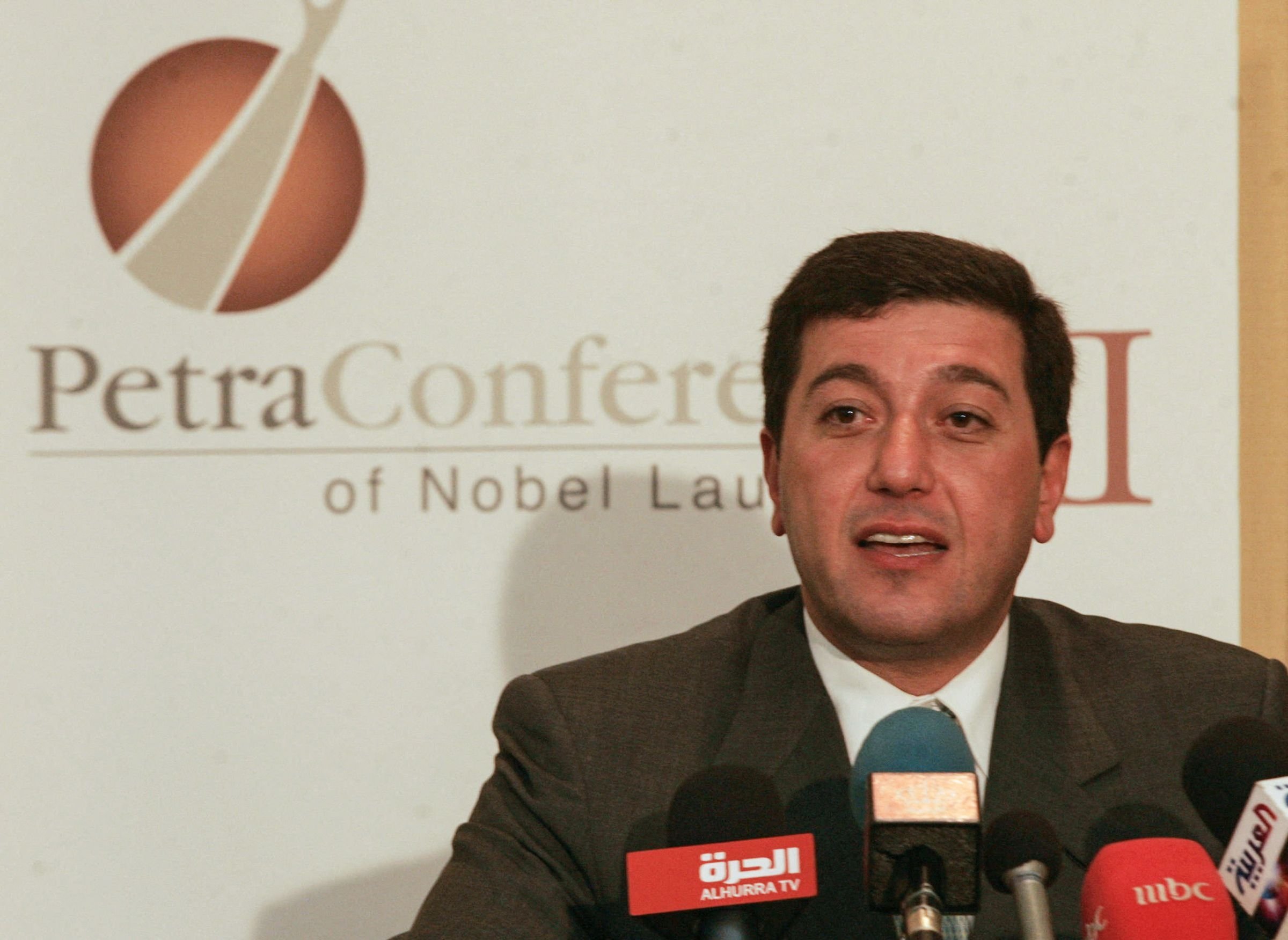 In this file photo taken on June 20, 2006 Jordanian Bassem Awadallah, vice-president of the King Abdullah II Fund for Development (KAFD), speaks to media a day before the opening of the two-day Second Petra Conference of Nobel Laureates hosted by Jordan's King Abdullah II and Nobel Peace winner Elie Wiesel, founder of the Elie Wiesel Foundation for Humanity, in the ancient city of Petra, about 80 kilometers south of the Dead Sea. (AFP Photo)