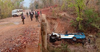 Security officers patrol the site of a bombing in the Narayanpur district of Chhattisgarh state, India, Tuesday, March 23, 2021. (AP Photo)