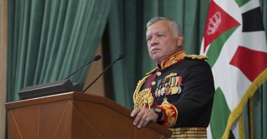 In this photo released by the Royal Hashemite Court, Jordan's King Abdullah II gives a speech during the inauguration of the 19th Parliament’s non-ordinary session, Amman, Jordan, Thursday, Dec. 10, 2020. (Yousef Allan/The Royal Hashemite Court via AP)