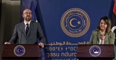 European Council President Charles Michel (L) and Libyan Foreign Minister Najla al-Mangoush hold a joint press conference in Libya's capital Tripoli, on April 4, 2021. (AFP Photo)