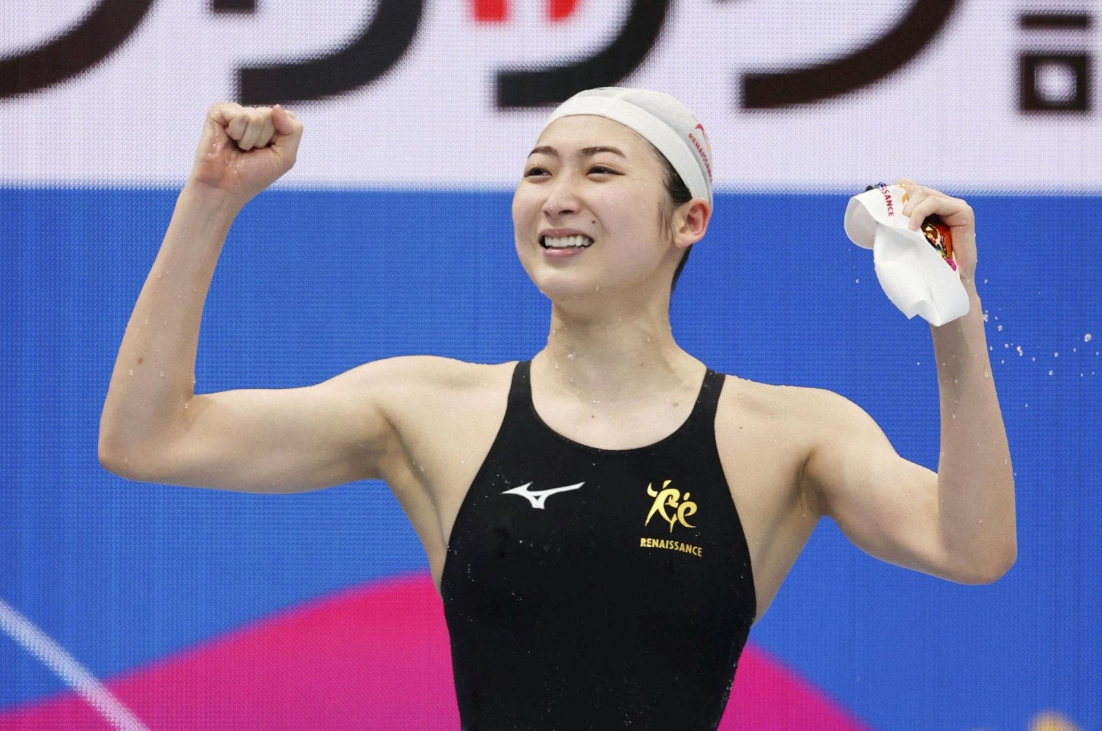 Japan's Rikako Ikee reacts after winning the women's 100-meter butterfly final at the national swimming championships at Tokyo Aquatics Centre in Tokyo, Japan, April 4, 2021 (Reuters Photo)