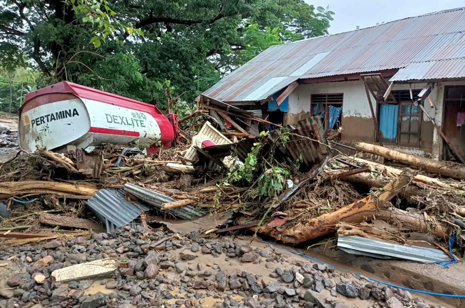 This general view shows debris left behind in the town of Adonara in East Flores on April 4, 2021, after flash floods and landslides swept eastern Indonesia and neighboring East Timor. (AFP Photo)