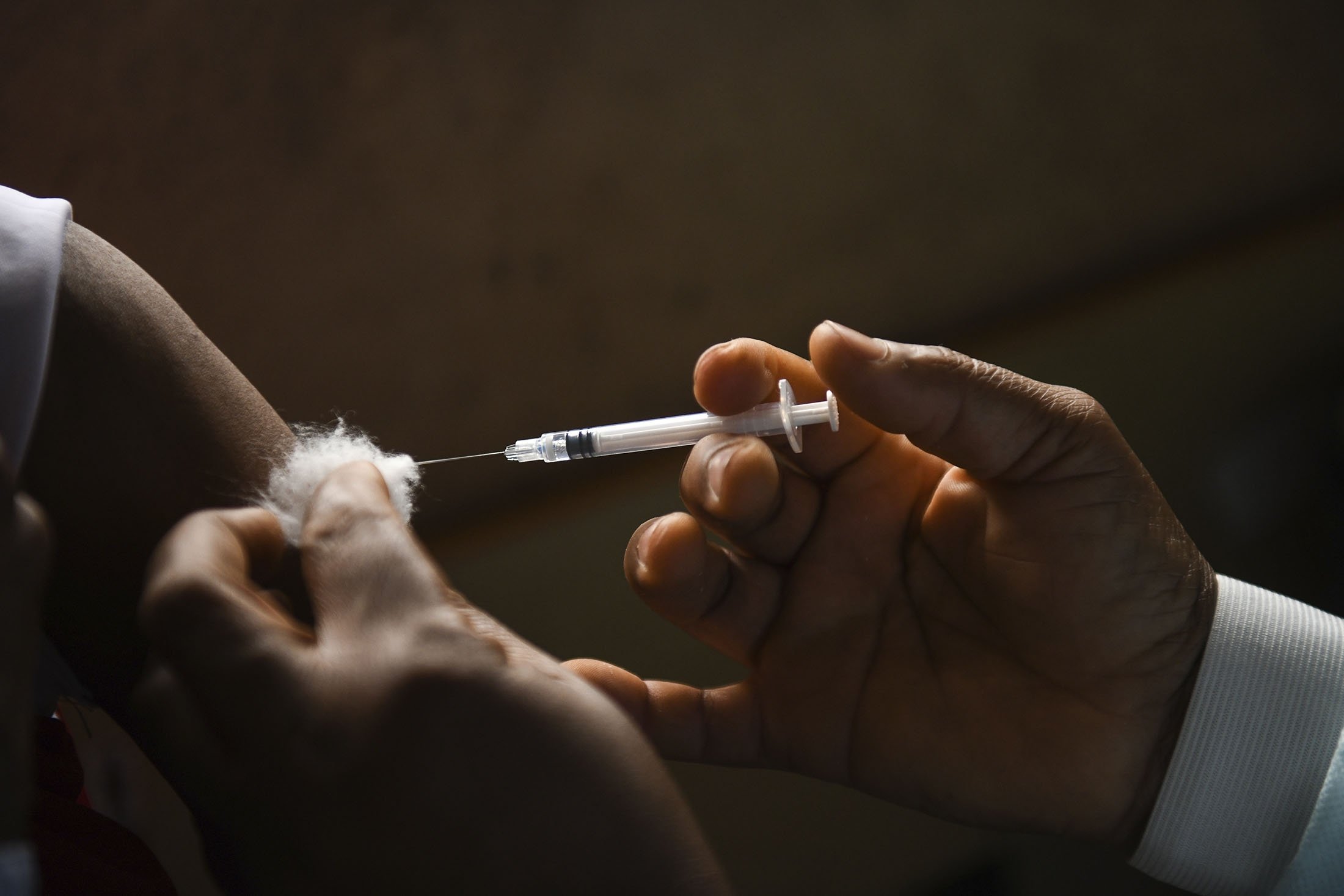 An AstraZeneca COVID-19 vaccine is administered at the Ndirande Health Centre in Blantyre Malawi, March 29, 2021. (AP Photo)