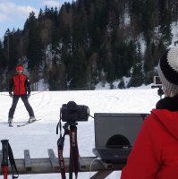 Fikri Özkan prepares for an online class as his wife sets up a camera and computer, in Artvin, northeastern Turkey, April 5, 2021. (AA PHOTO)