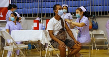 A man receives the Sinovac COVID-19 vaccine as the Thai resort island of Phuket rushes to vaccinate its population amid the coronavirus outbreak, and ahead of a July 1 ending of strict quarantine for overseas visitors, to bring back tourism revenue in Phuket, Thailand, April 1, 2021. (Reuters Photo)