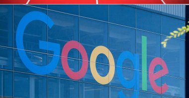 This combination of pictures created on Oct. 2, 2020 shows the Oracle logo (top) at the Oracle OpenWorld 2011 in San Francisco; and a Google logo at the Googleplex in Menlo Park, California on Nov. 4, 2016. (AFP Photo)