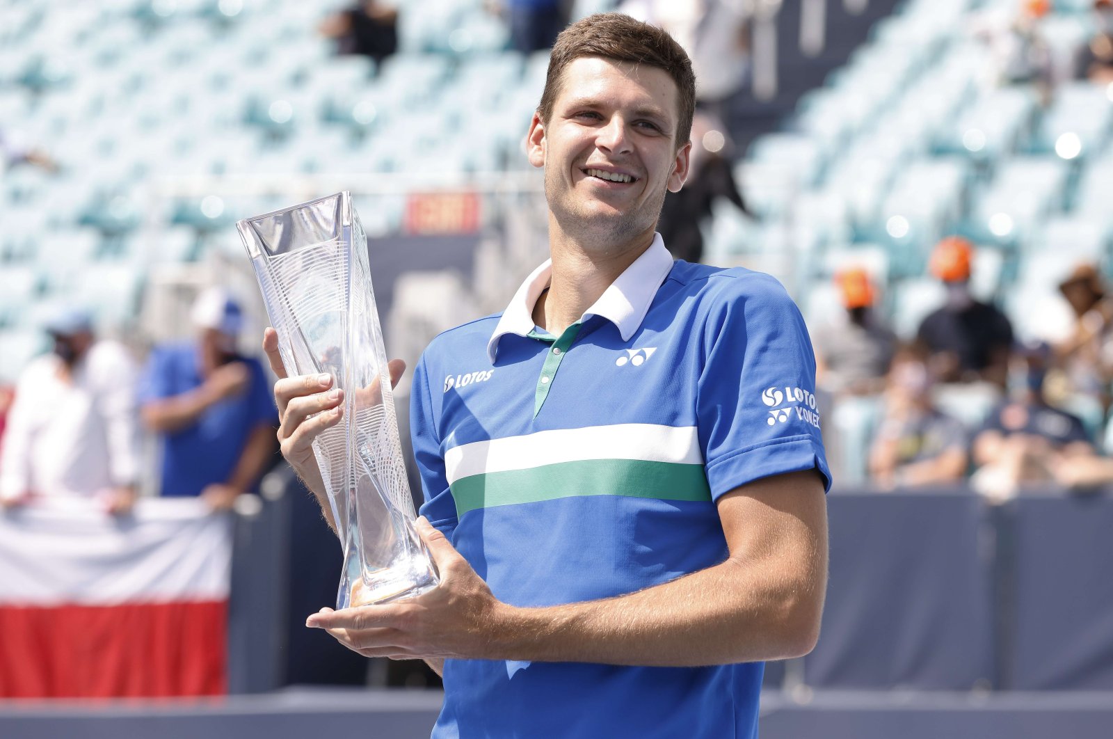 Poland's Hubert Hurkacz poses with the Miami Open trophy after beating Italy's Jannik Sinner in the final at Hard Rock Stadium, Miami Gardens, Florida, April 04, 2021. (AFP Photo)