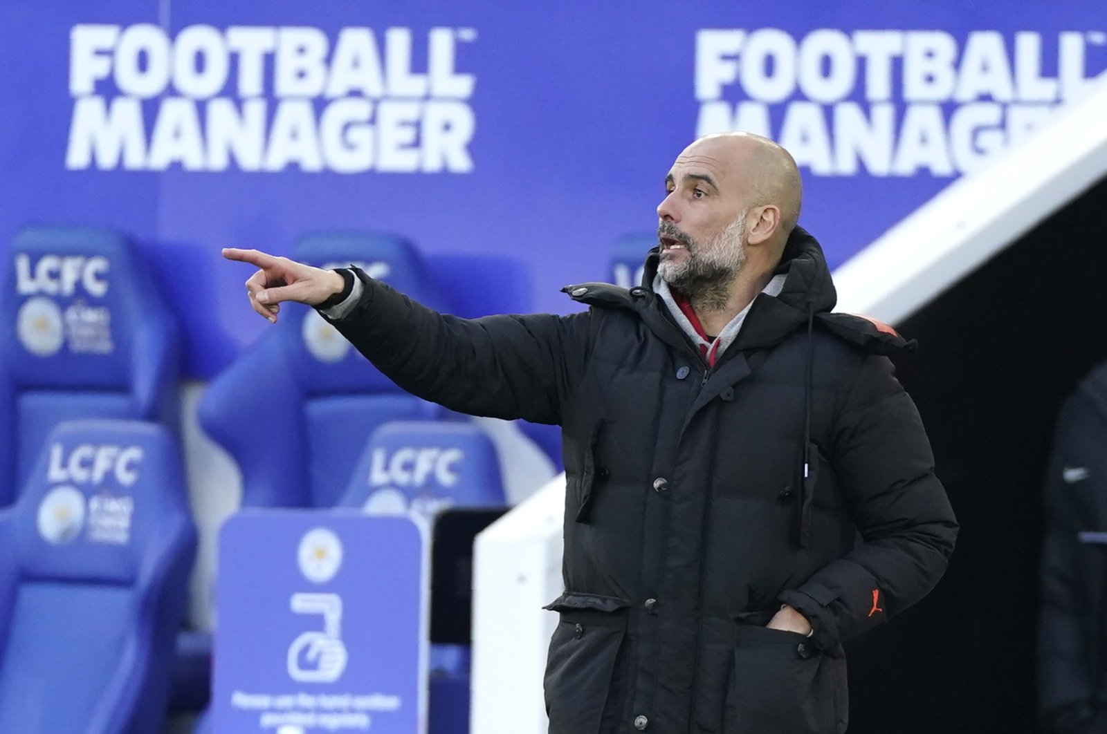 Manchester City manager Pep Guardiola gestures during a Premier League match against Leicester City at the King Power Stadium in Leicester, England, April 3, 2021. (AP Photo)